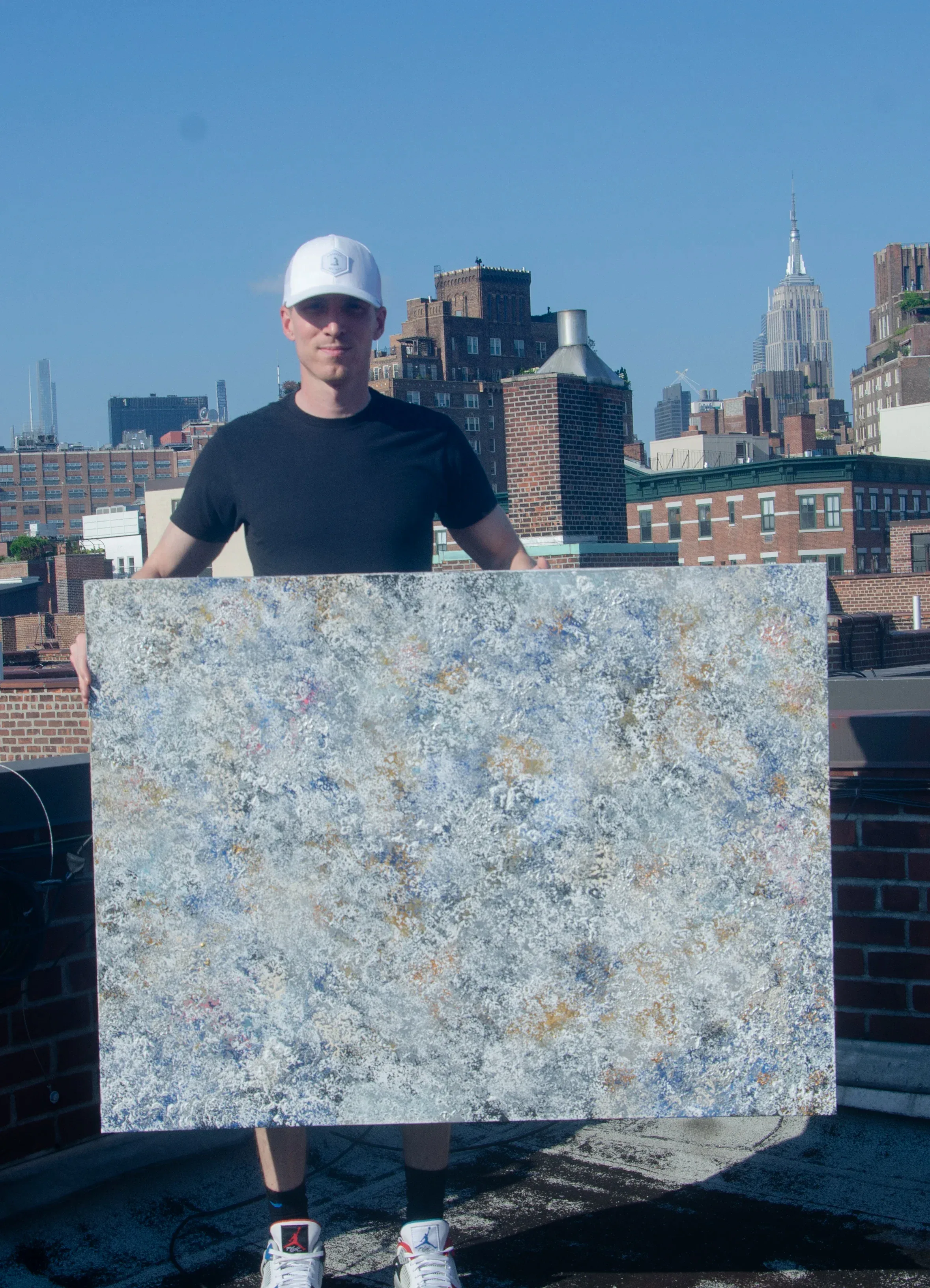 Artist on rooftop